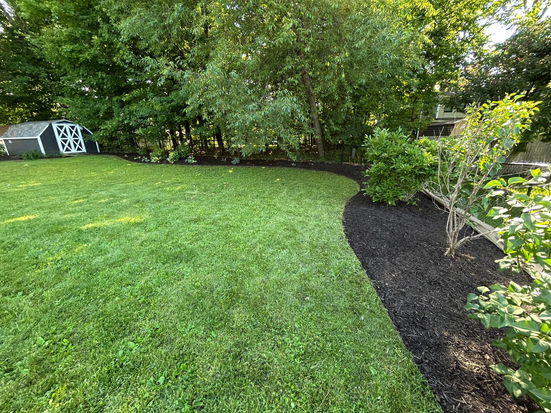 Gallery photos for Fresh Mulch Installation That Pulls the Whole Yard Together: Image #2