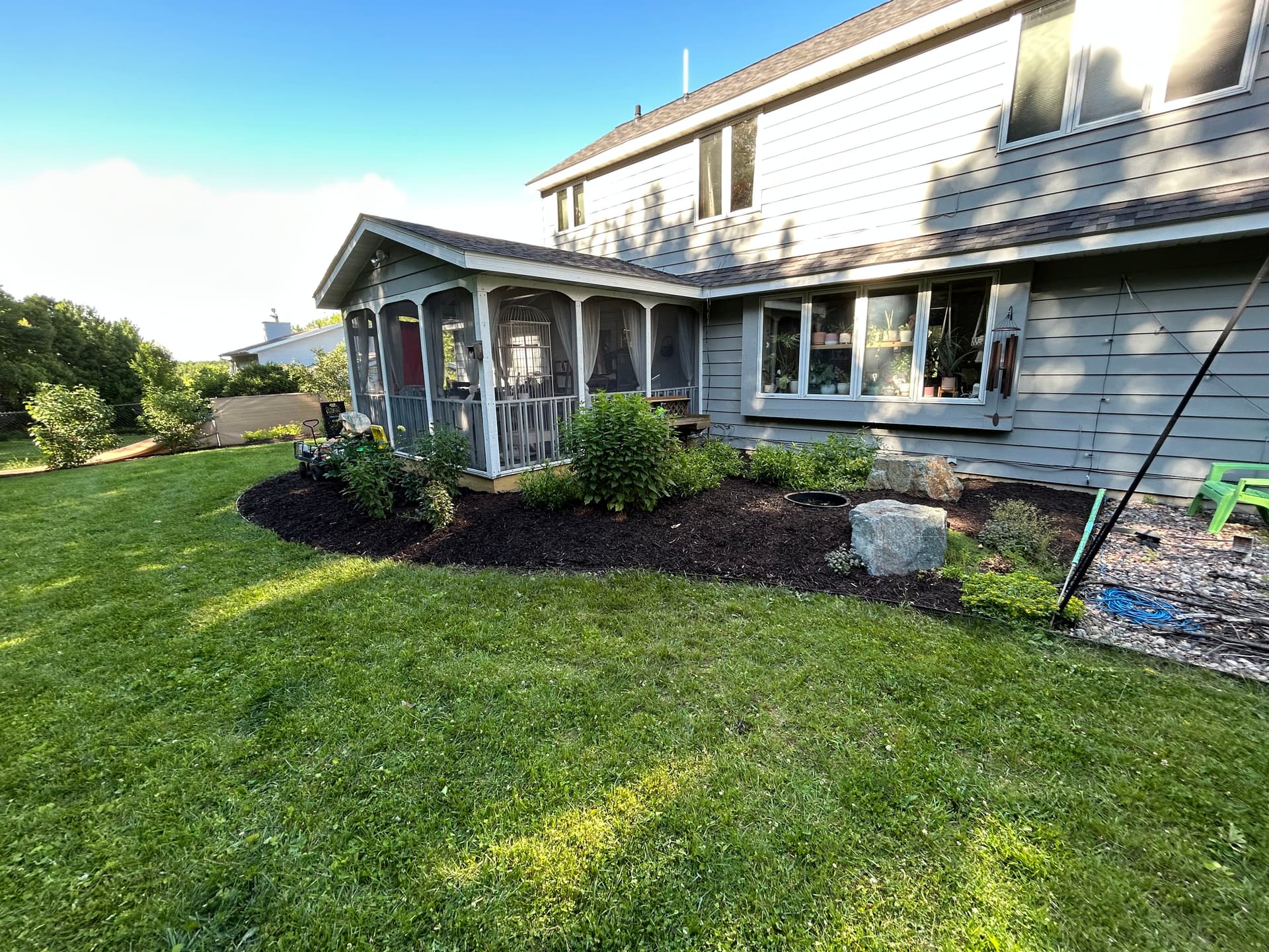 Gallery photos for Fresh Mulch Installation That Pulls the Whole Yard Together: Image #1