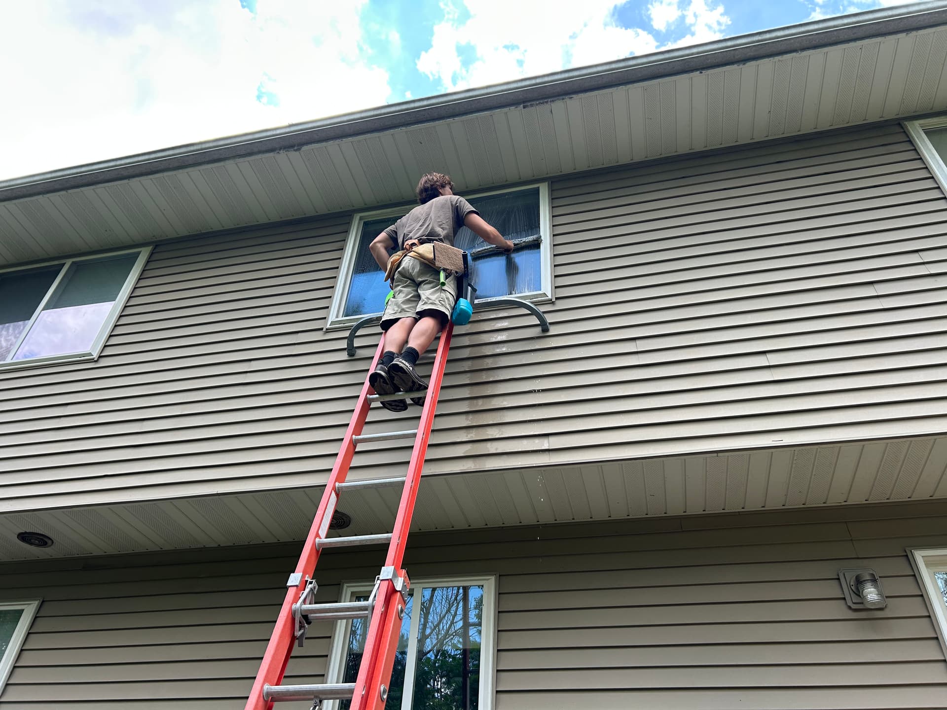 Second-Story Window Cleaning Done Right and Done Safely image